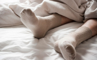 Навіщо надягати шкарпетки перед сном