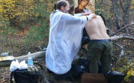 Російський священник хрестив окупантів у мішках для трупів. ФОТО
