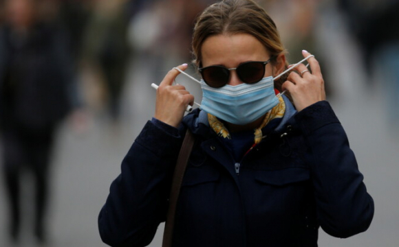 Скільки часу ще доведеться носити маски: невтішні прогнози медиків